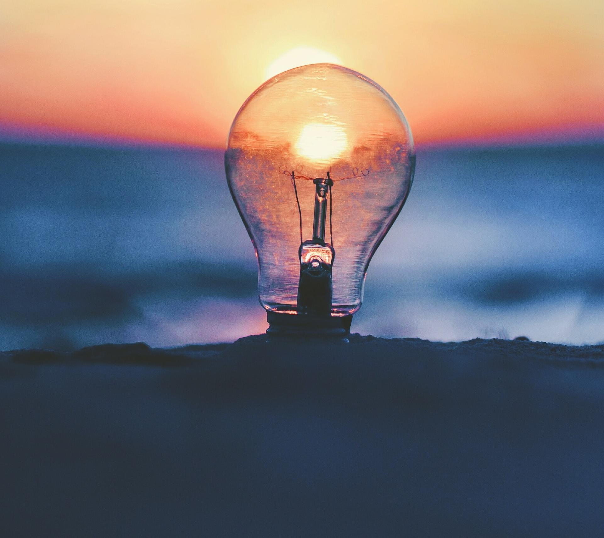 selective focus photography of light bulb
